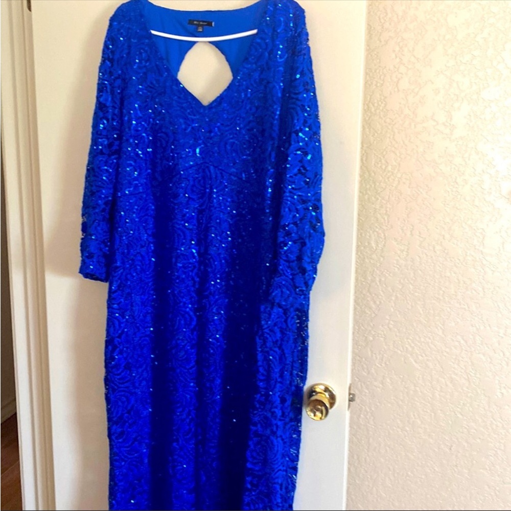 Keyhole back long sequined dress.